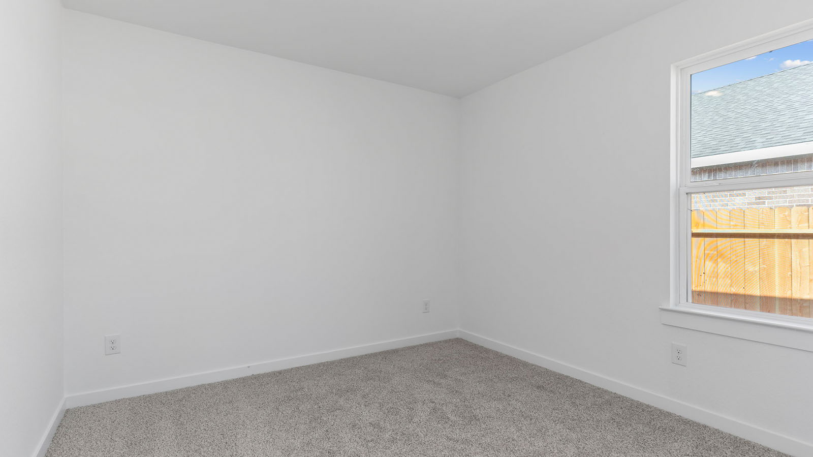 Secondary bedroom with large window