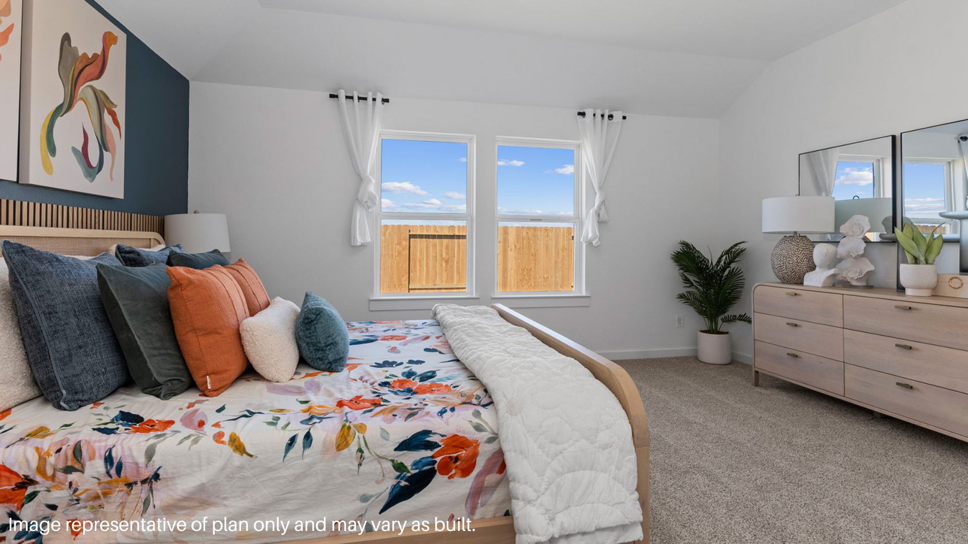 Primary bedroom with large window