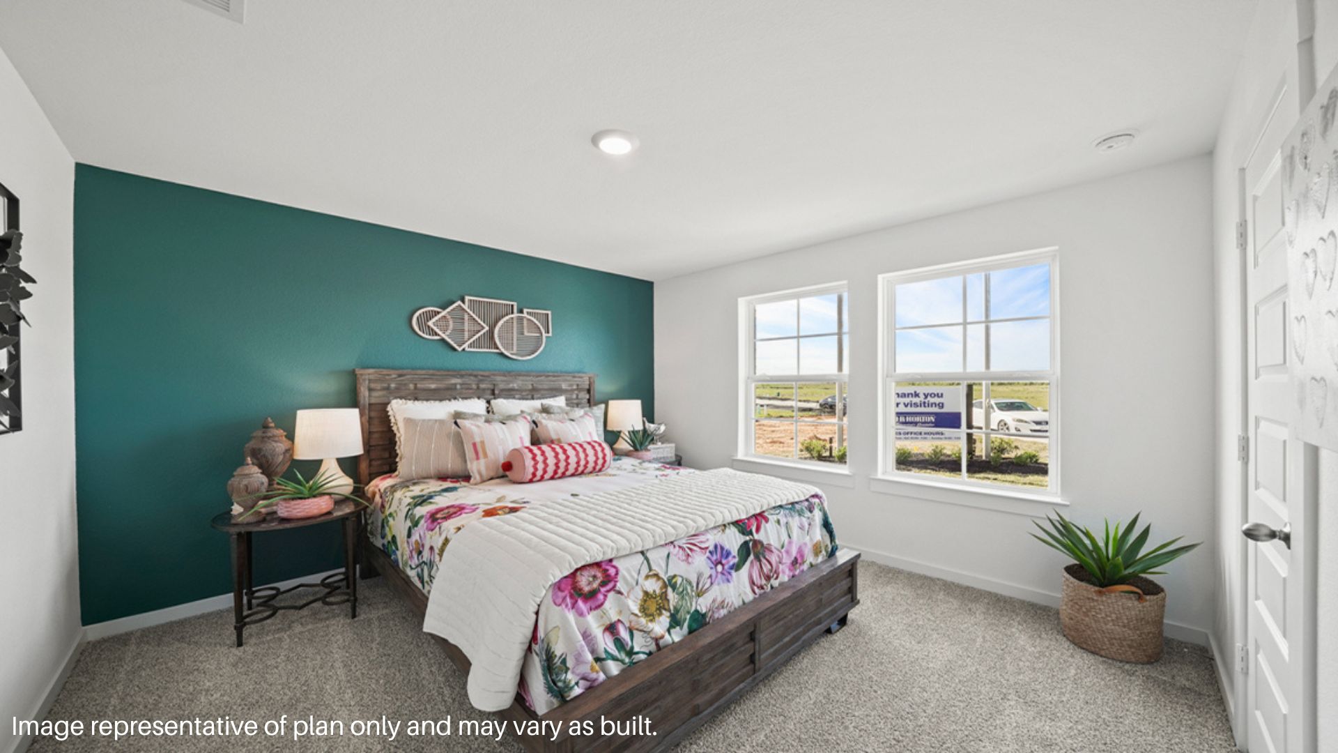 Secondary bedroom in the front on the home. Opens to large windows
