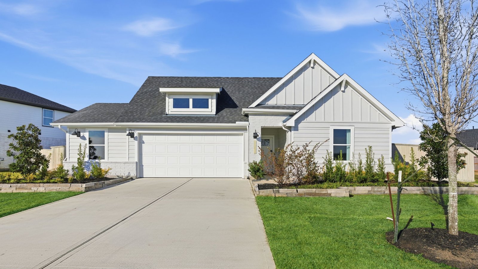 single story home with a two car garage