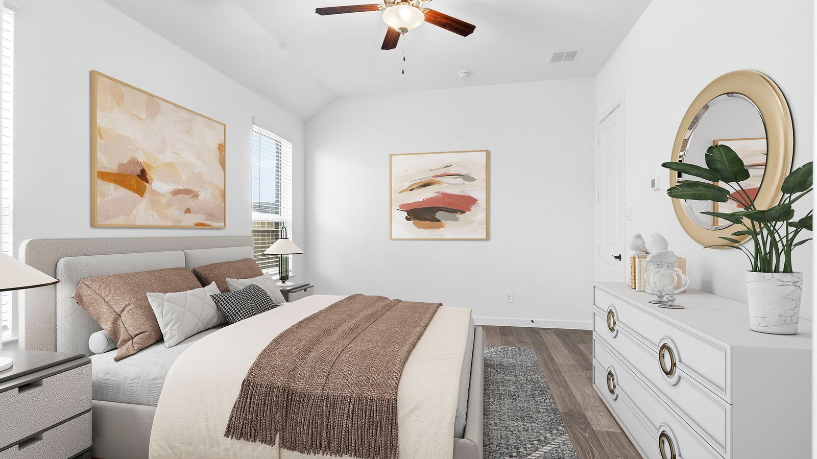 A spacious primary bedroom emphasizing open space and natural lighting with large windows.