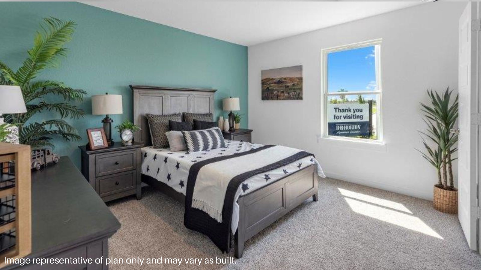 Secondary Bedroom with a large window that brings in Natural lighting