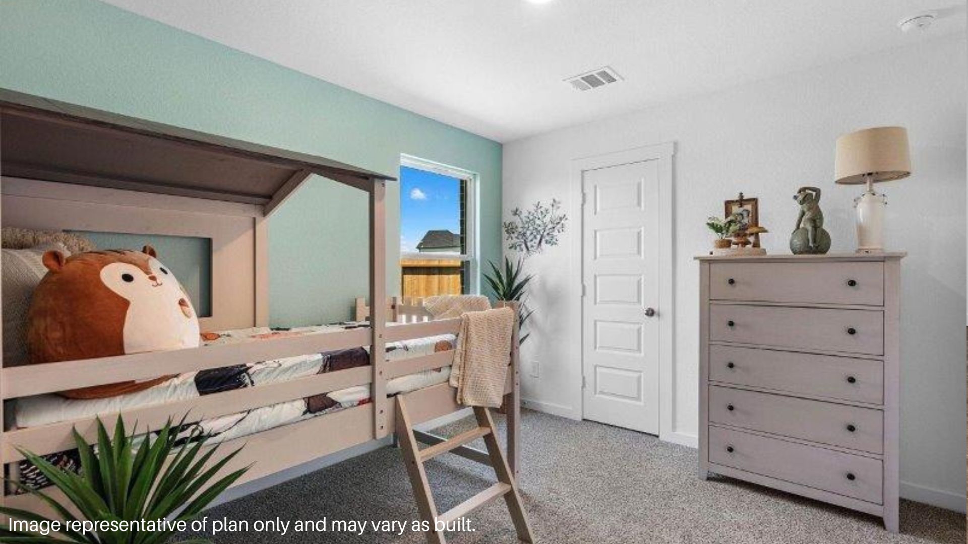 Secondary Bedroom with a large window that brings in Natural lighting