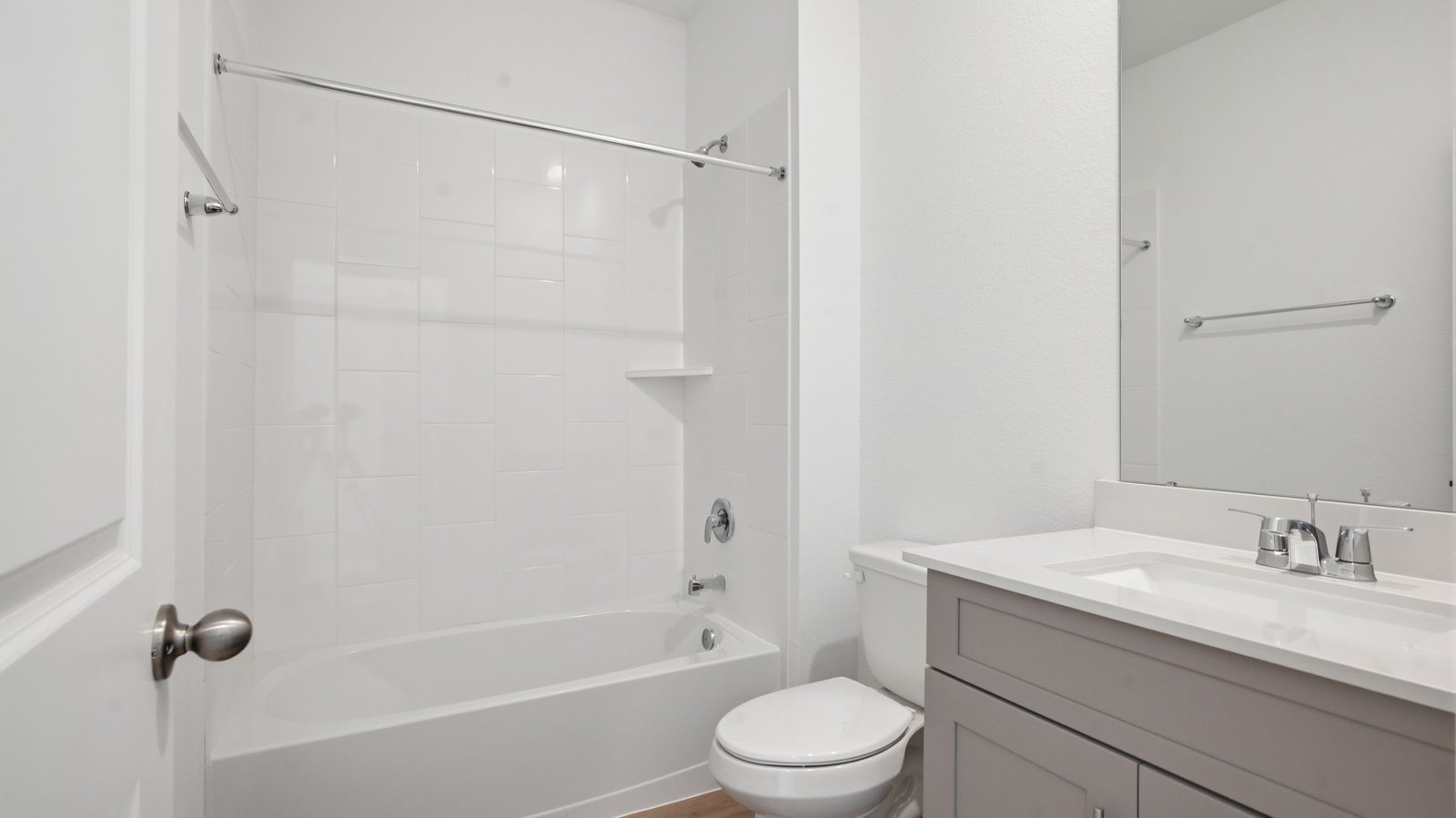 A well-designed bathroom equipped with granite countertops, emphasizing functionality and contemporary style.