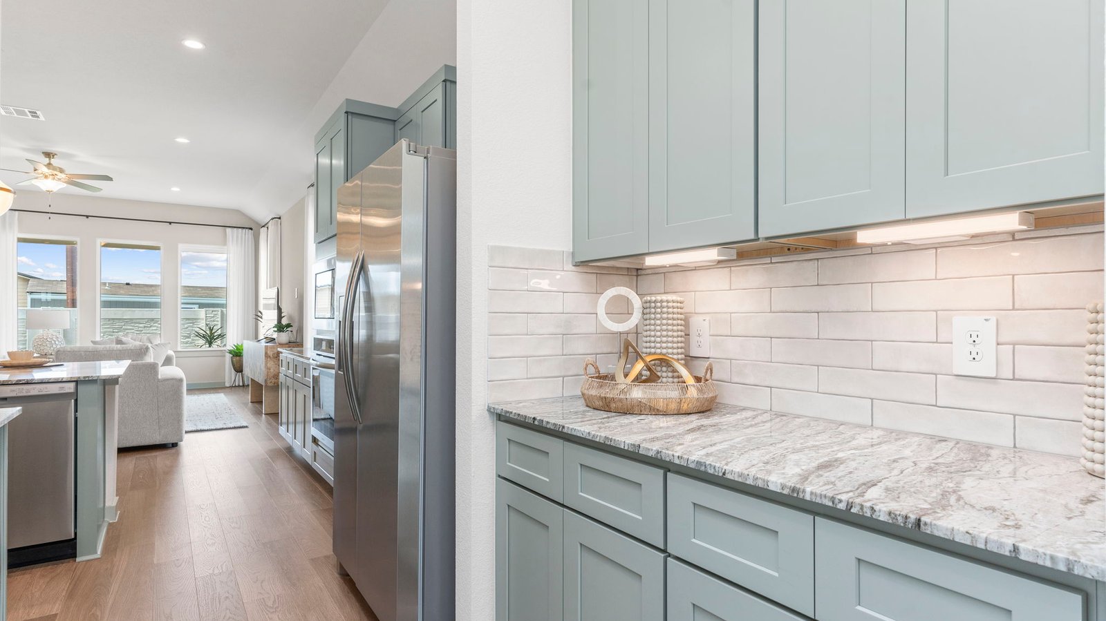 The walkway from the dining area to the kitchen with extra cabinetry for additional storage