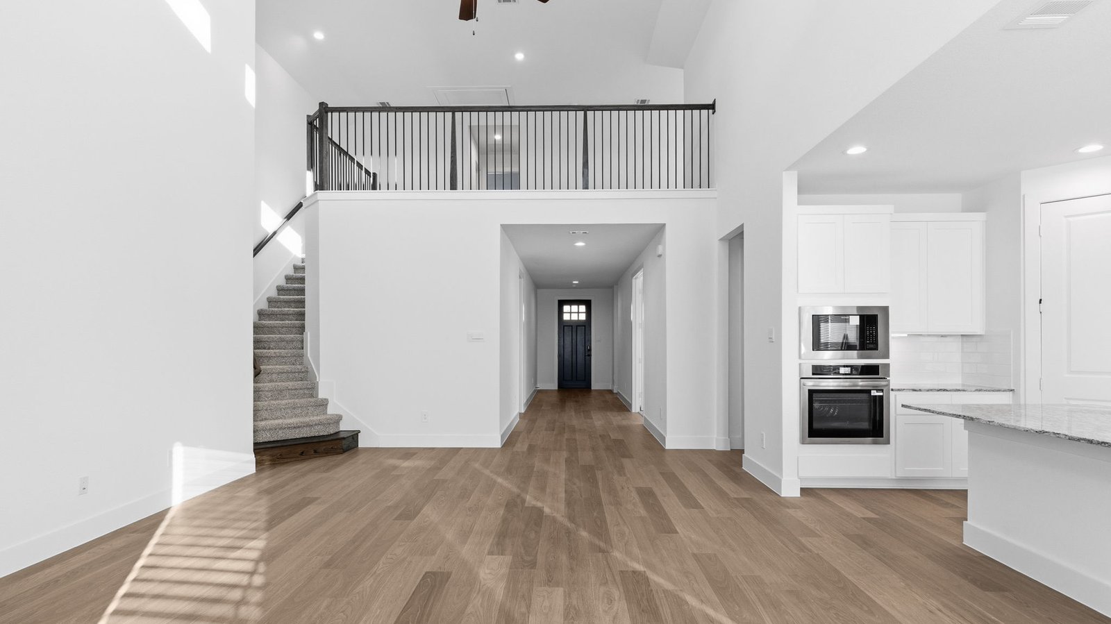 open concept living room with tall ceilings
