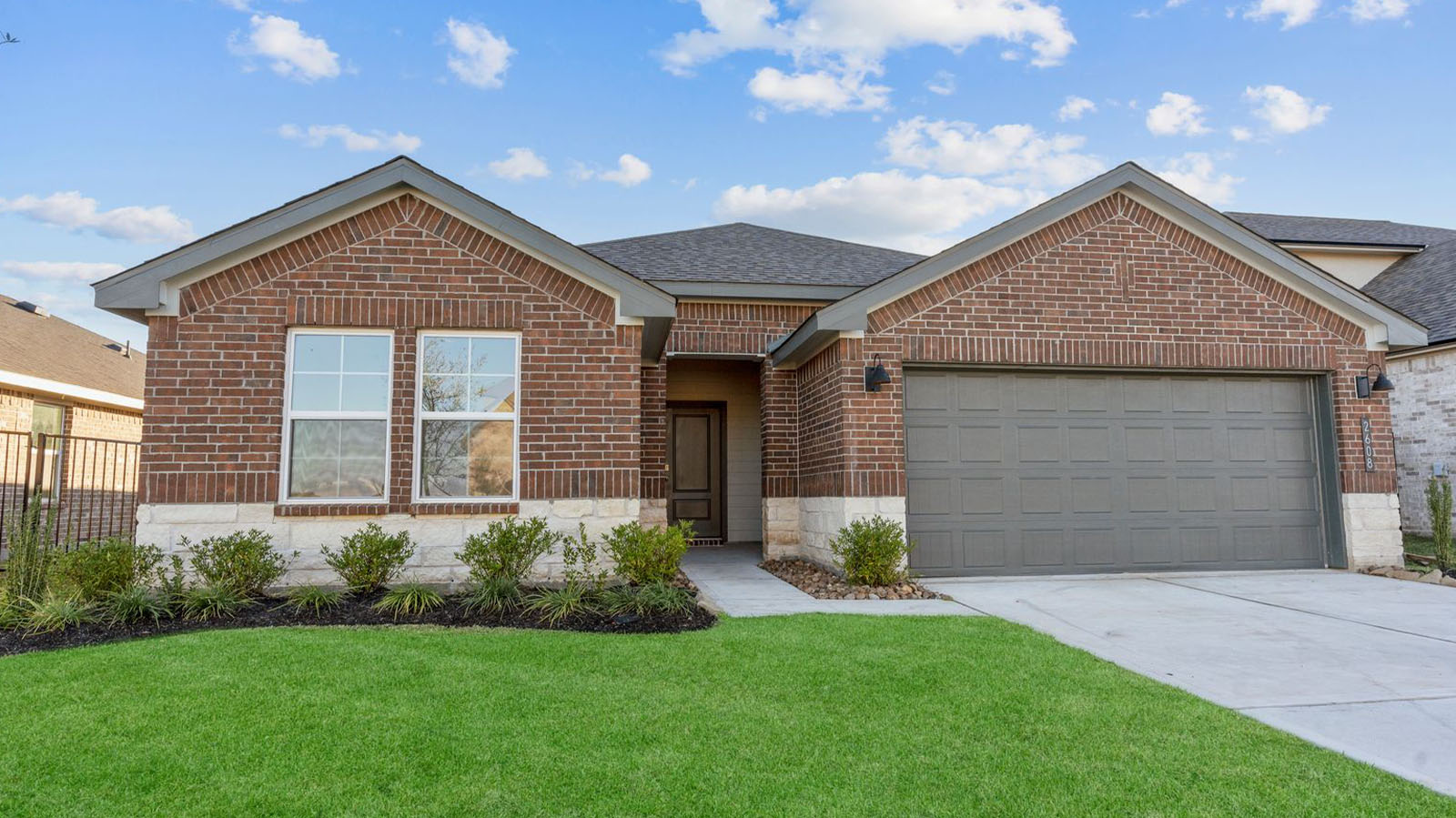 single story home with a two car garage