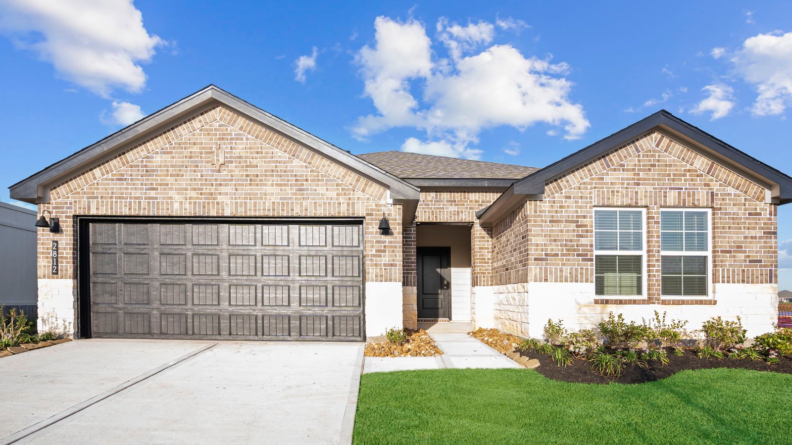 single story home with a two car garage