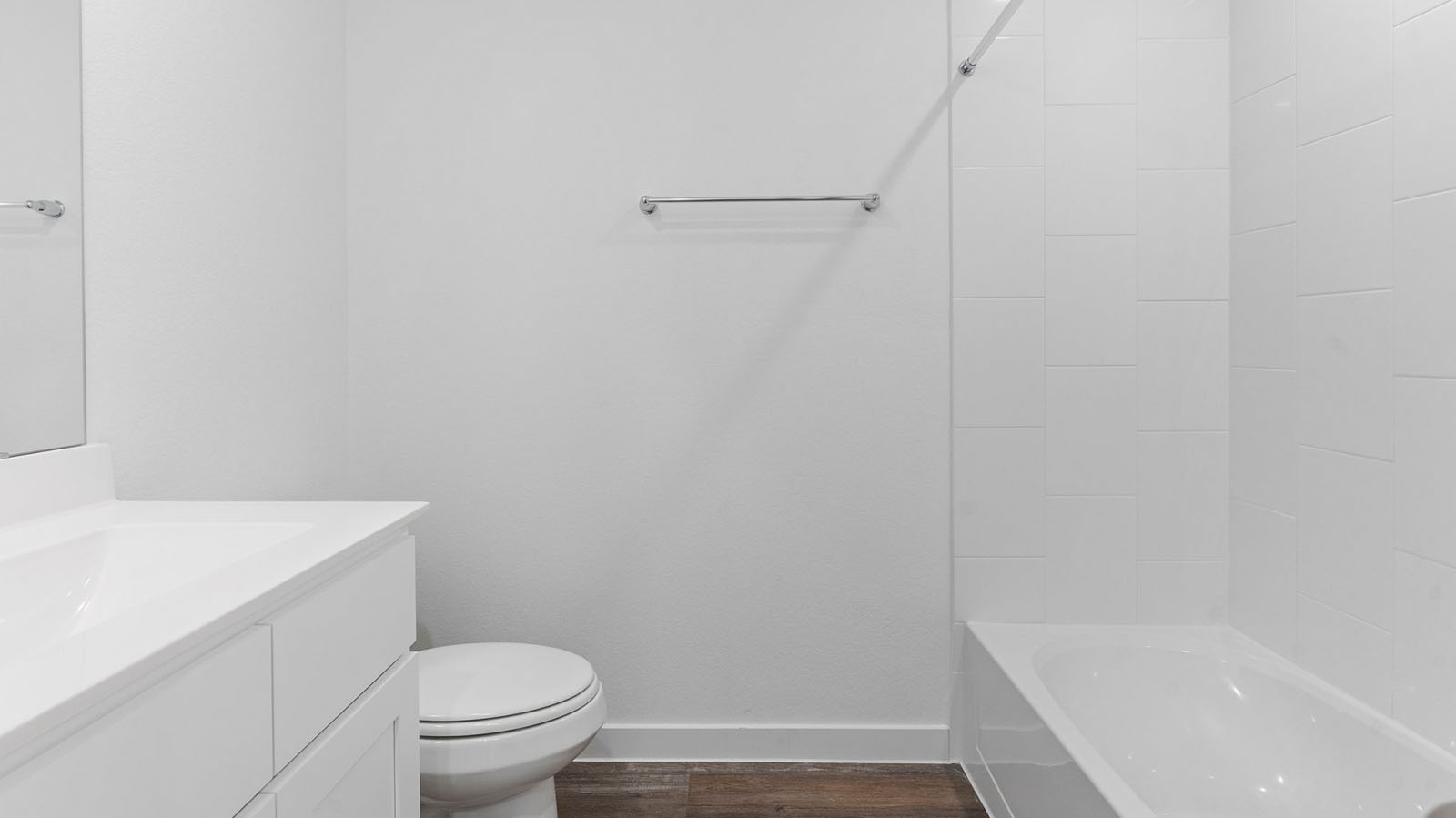 A well-designed bathroom equipped with granite countertops, emphasizing functionality and contemporary style.