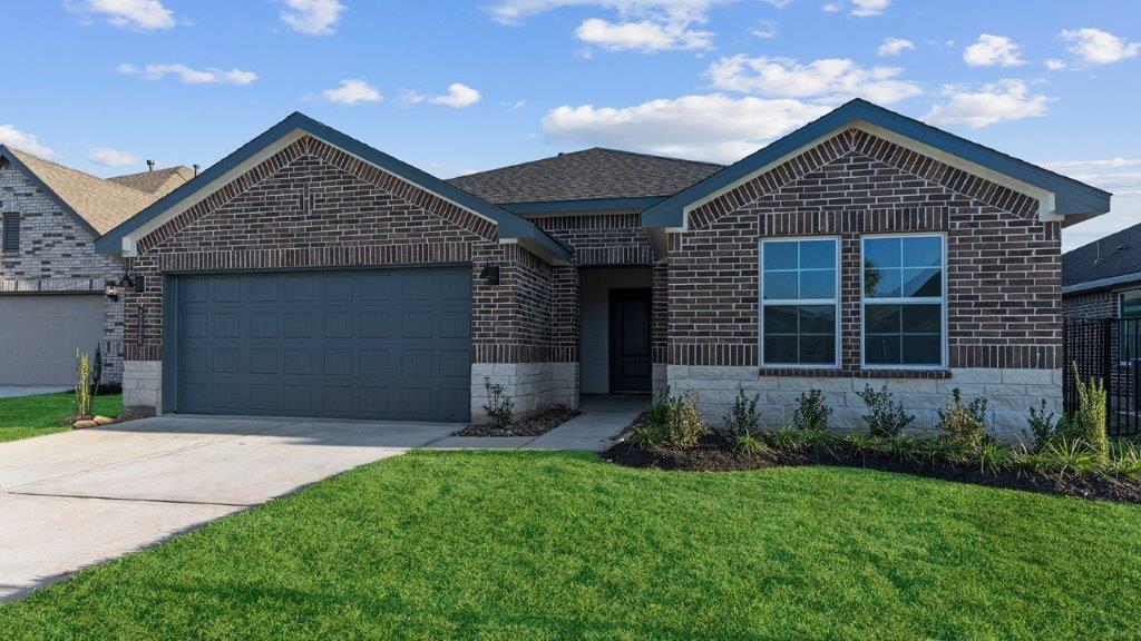 single story home with a two car garage