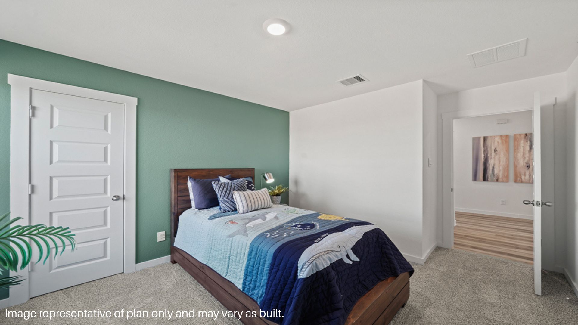 Spacious secondary bedroom with window and closet