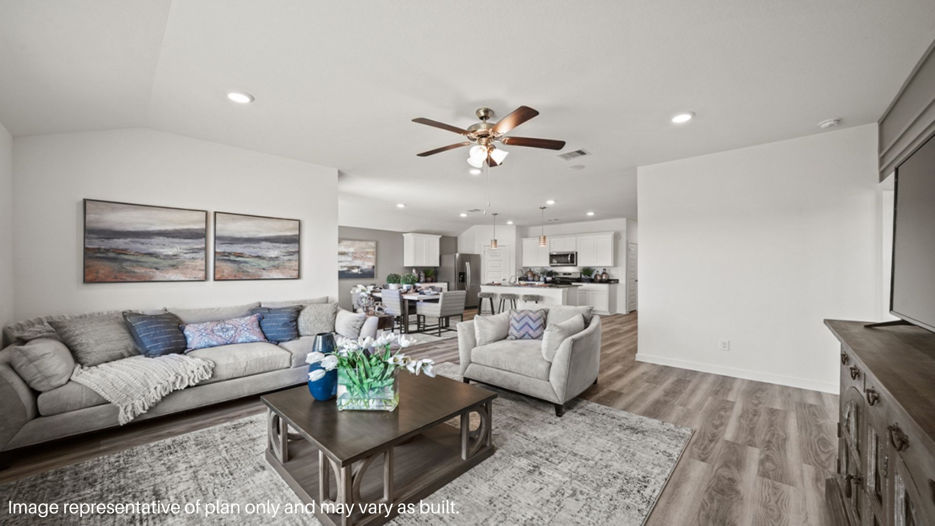 Spacious living room with large windows and plenty of space to entertain