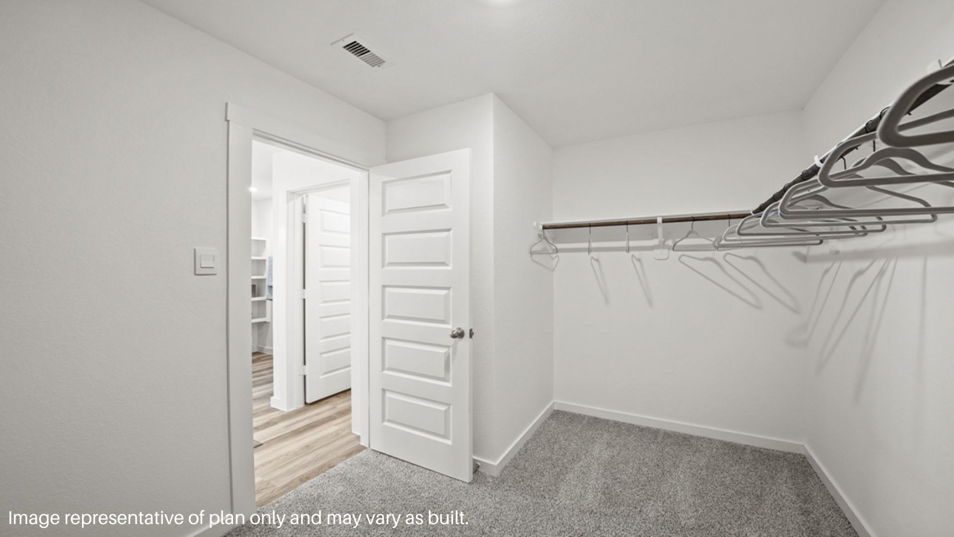 Large walk-in closet in the primary bathroom and bedroom