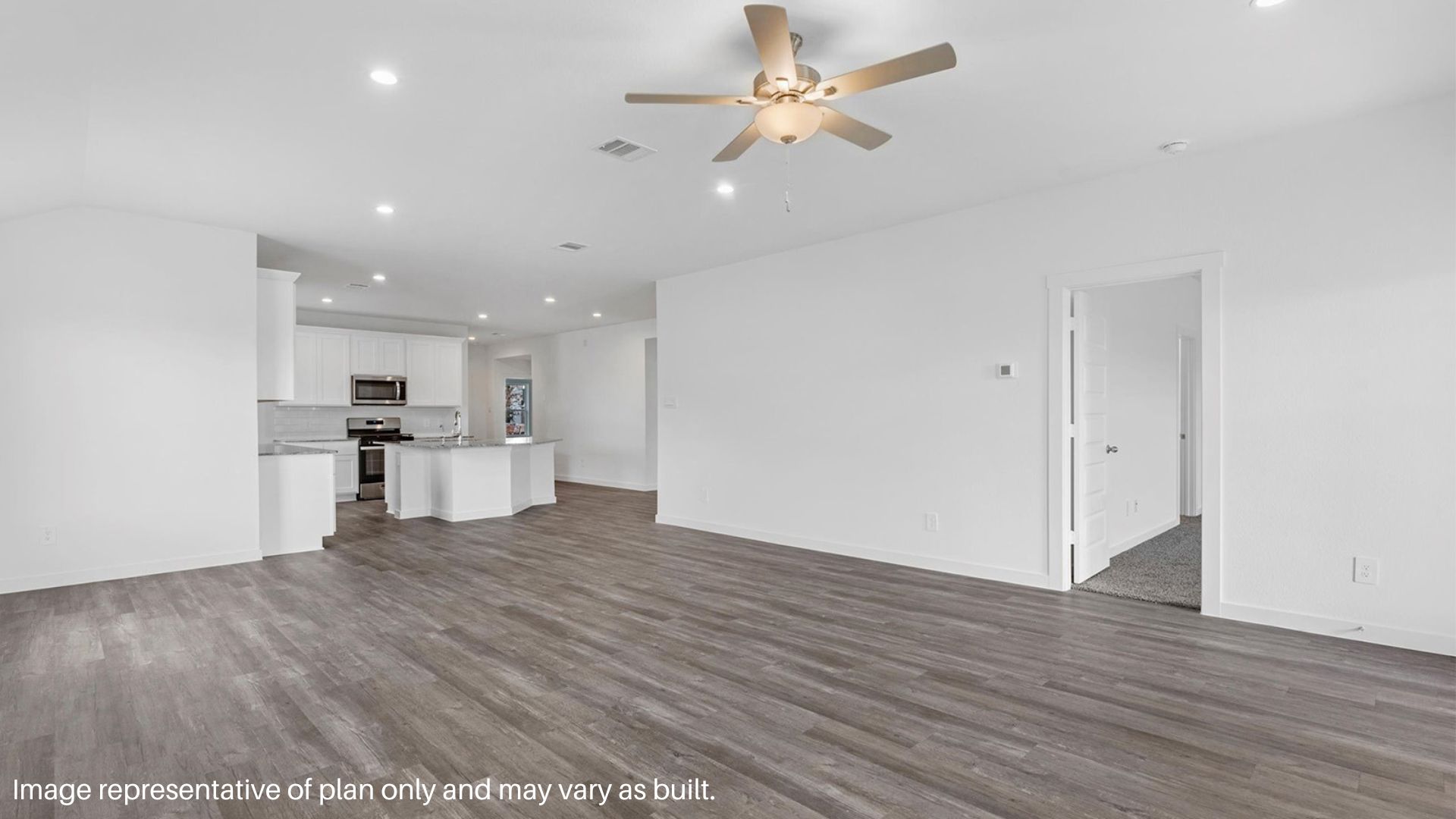 Spacious living room the overlooks the kitchen