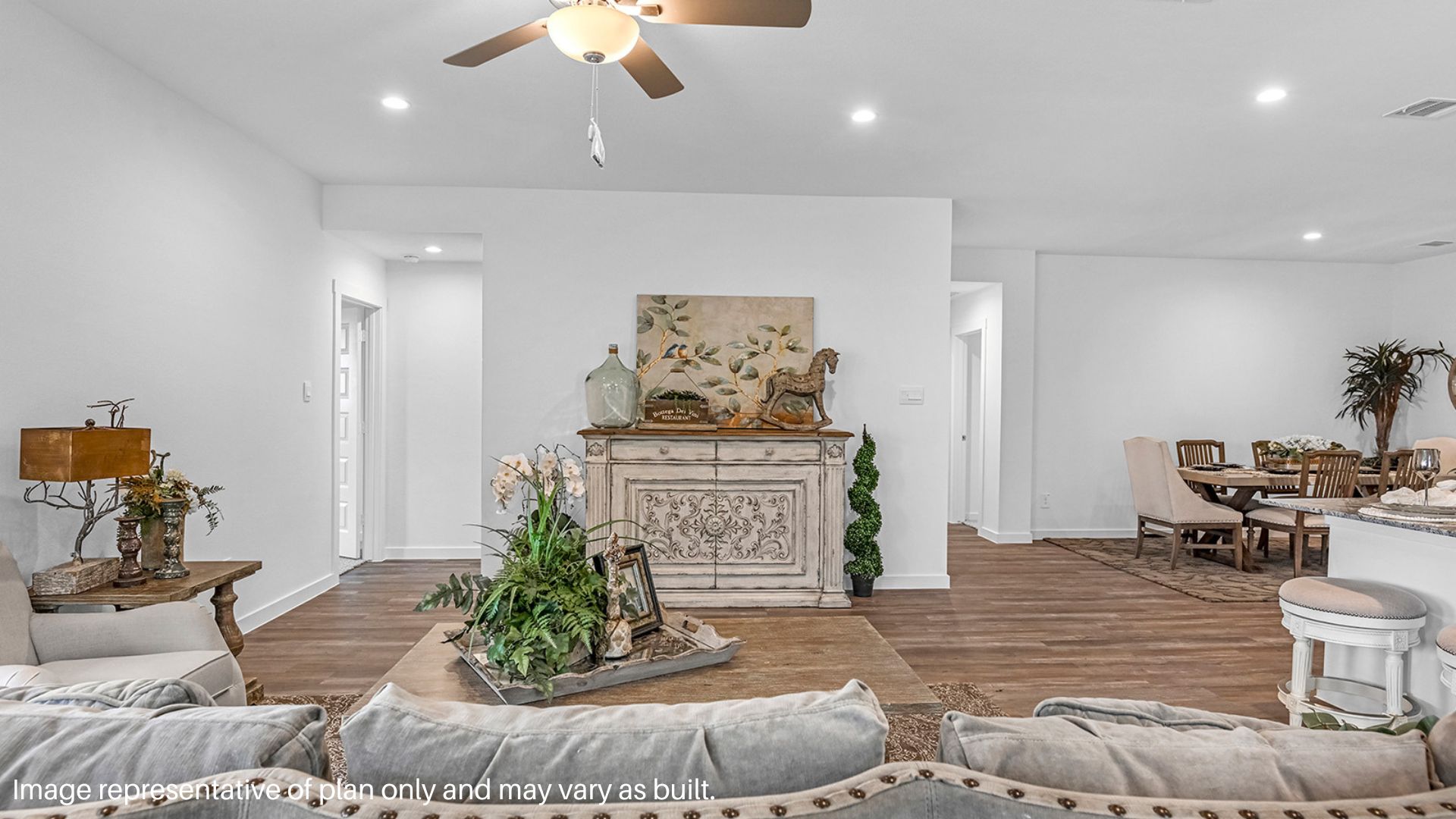 Gorgeous living space with open concept and large windows