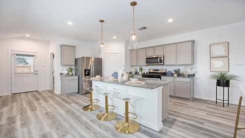 Kitchen with a island and a walk in pantry