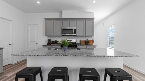 Kitchen with a island and a walk in pantry