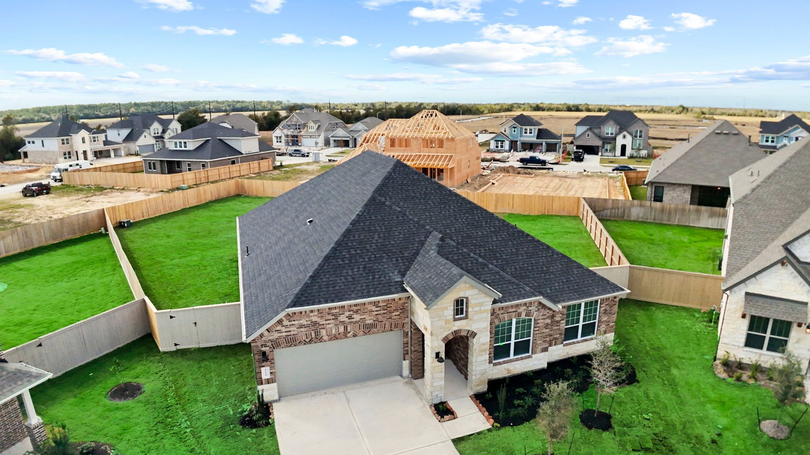 Cardinale floor plan one story brick home aerial view of roof pitch