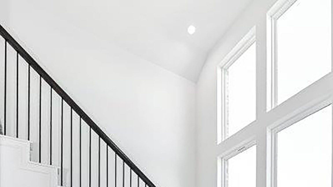 Stairway to 2nd floor with windows