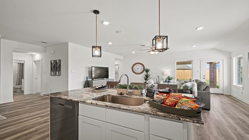 kitchen opens to living room