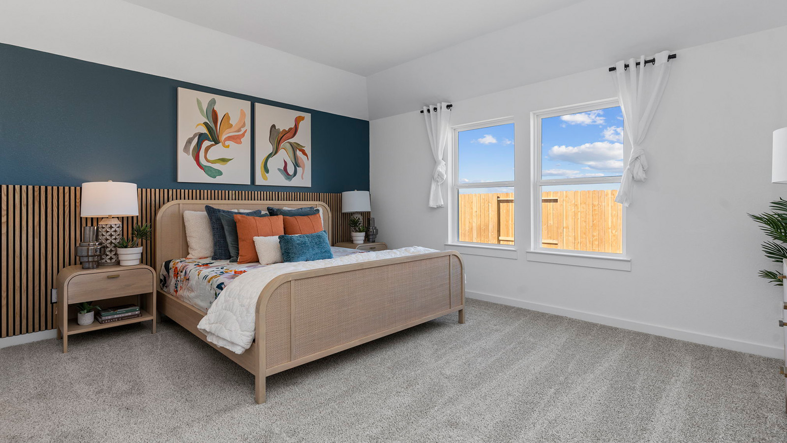 primary bedroom with large windows