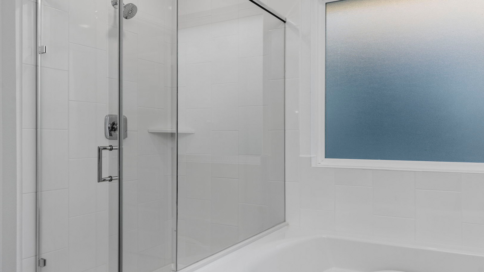 primary bathroom tub and shower