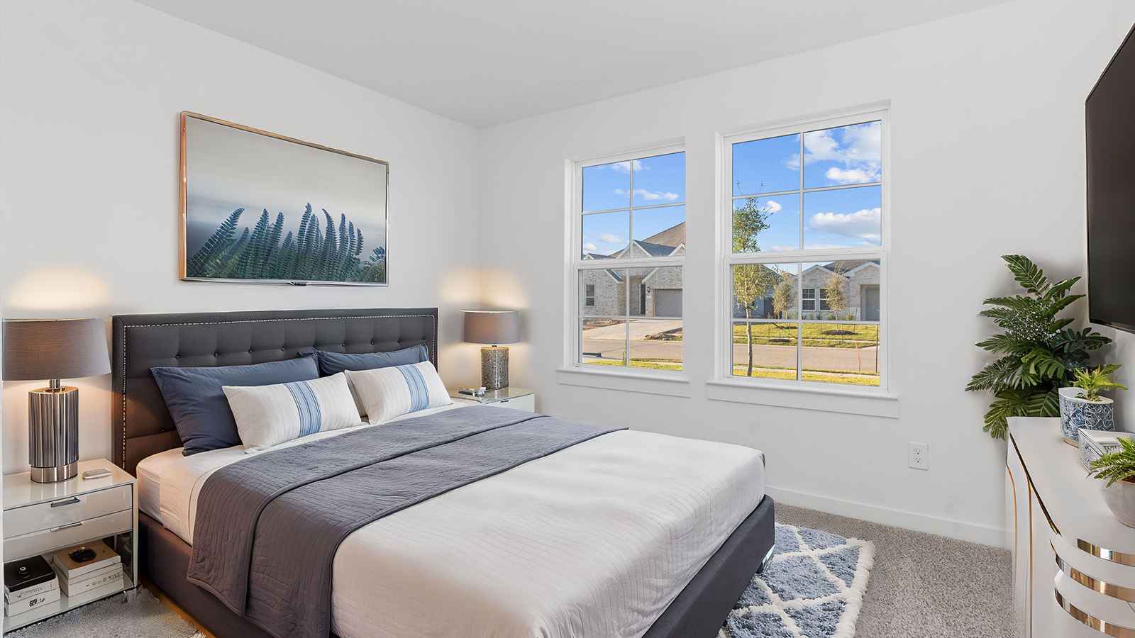 secondary bedroom with one window staged