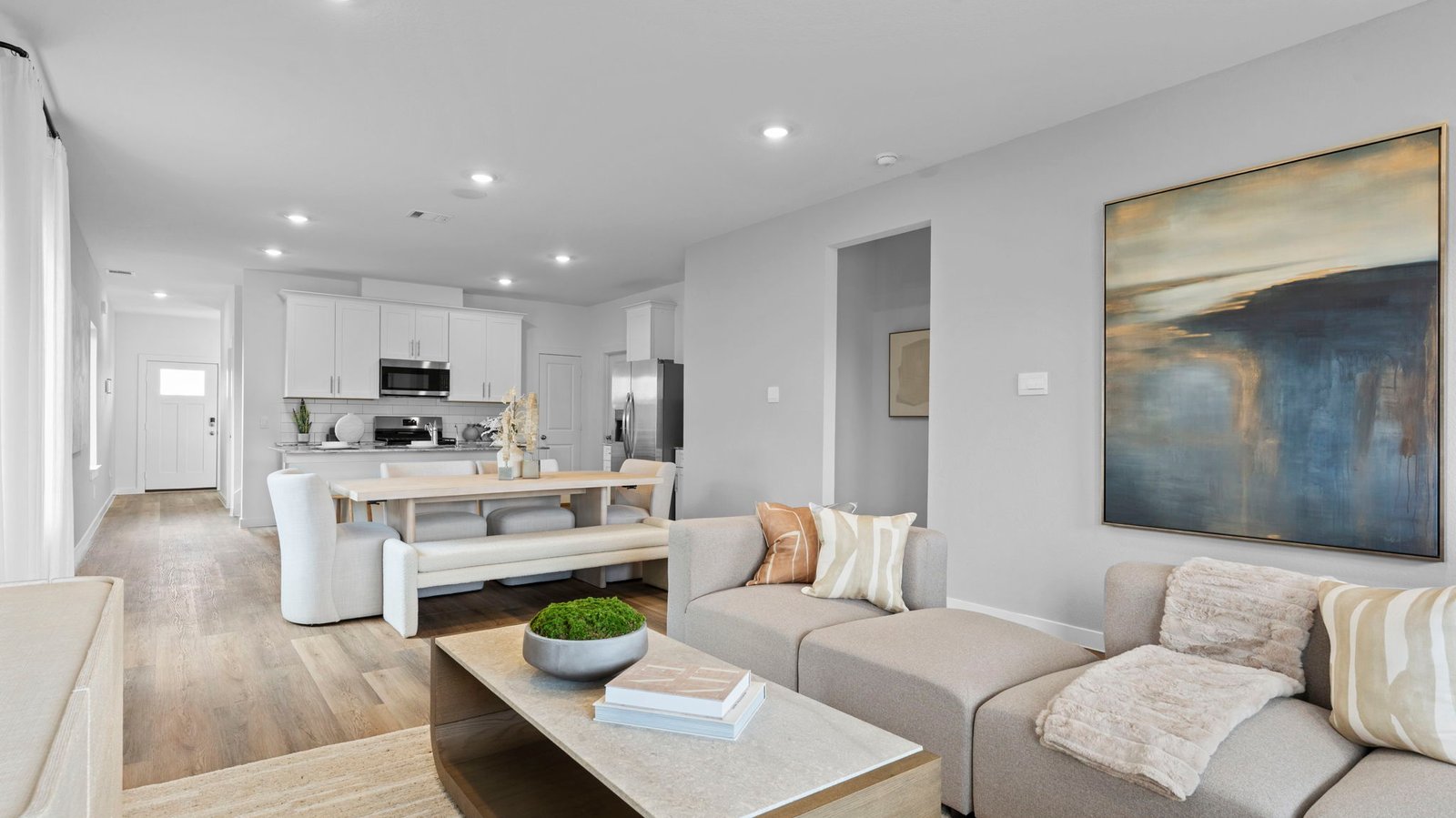 open concept kitchen dining and living room