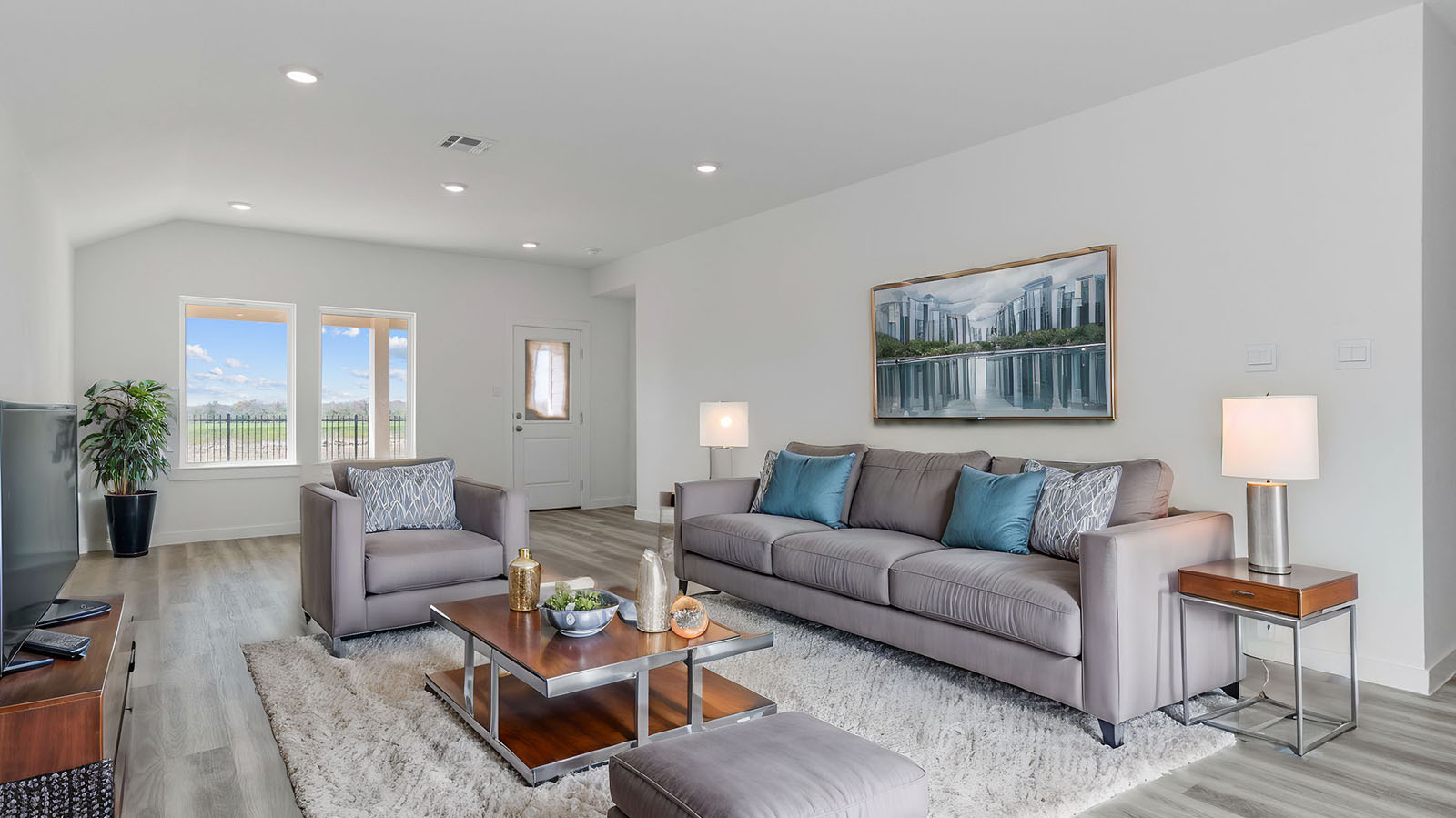 Spacious living room with two large windows