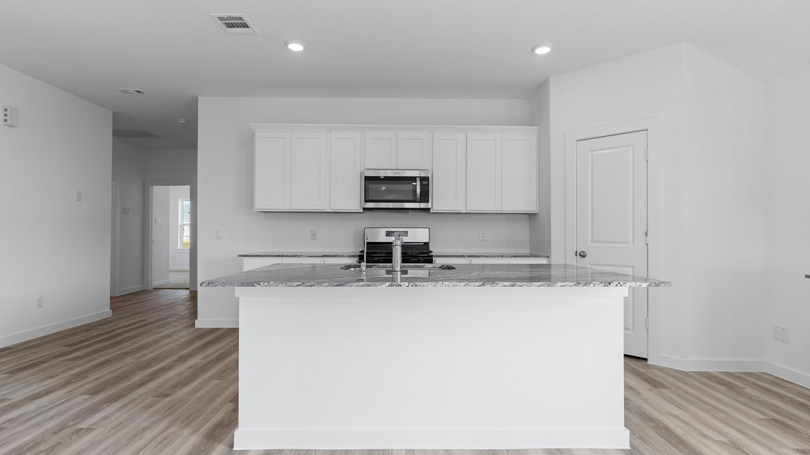 Kitchen with large island and deep sink