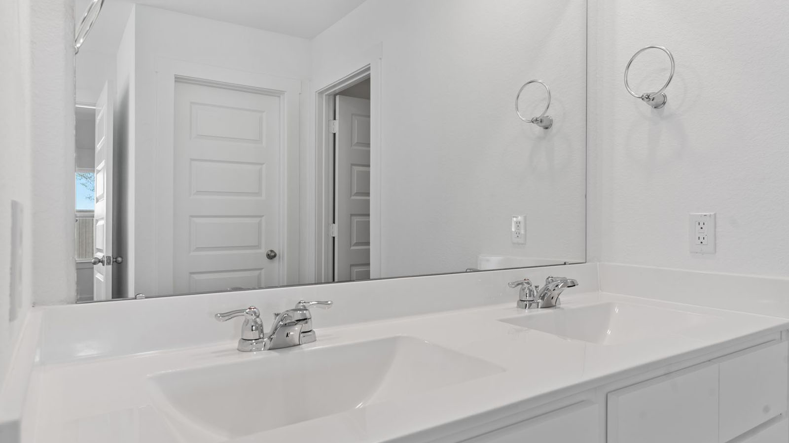 Primary bathroom vanity with double sinks