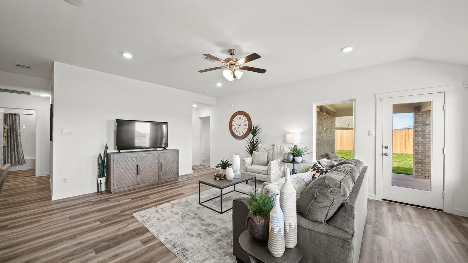 Living room with large window and patio door