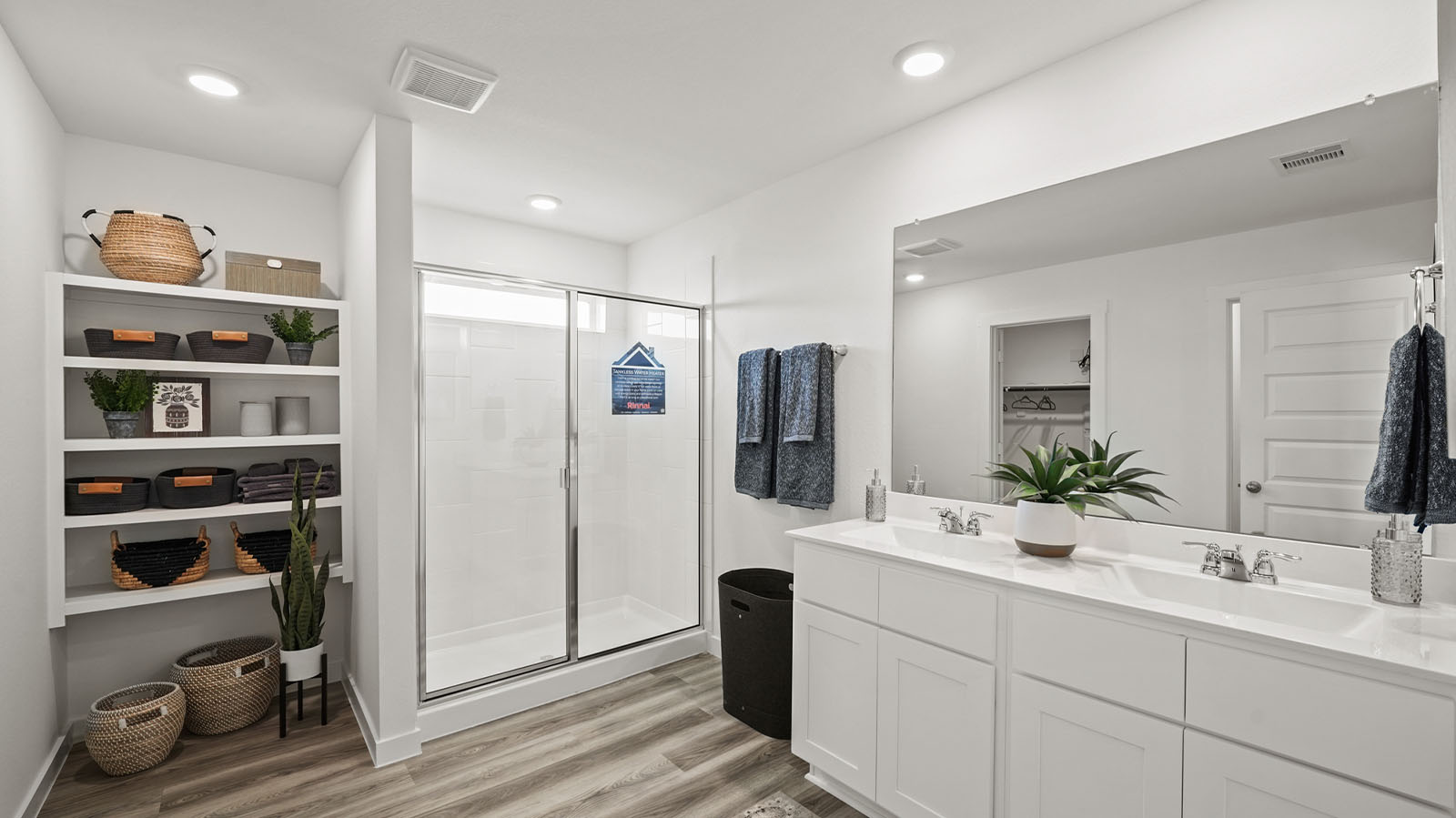 Primary bathroom with shower and opening shelving