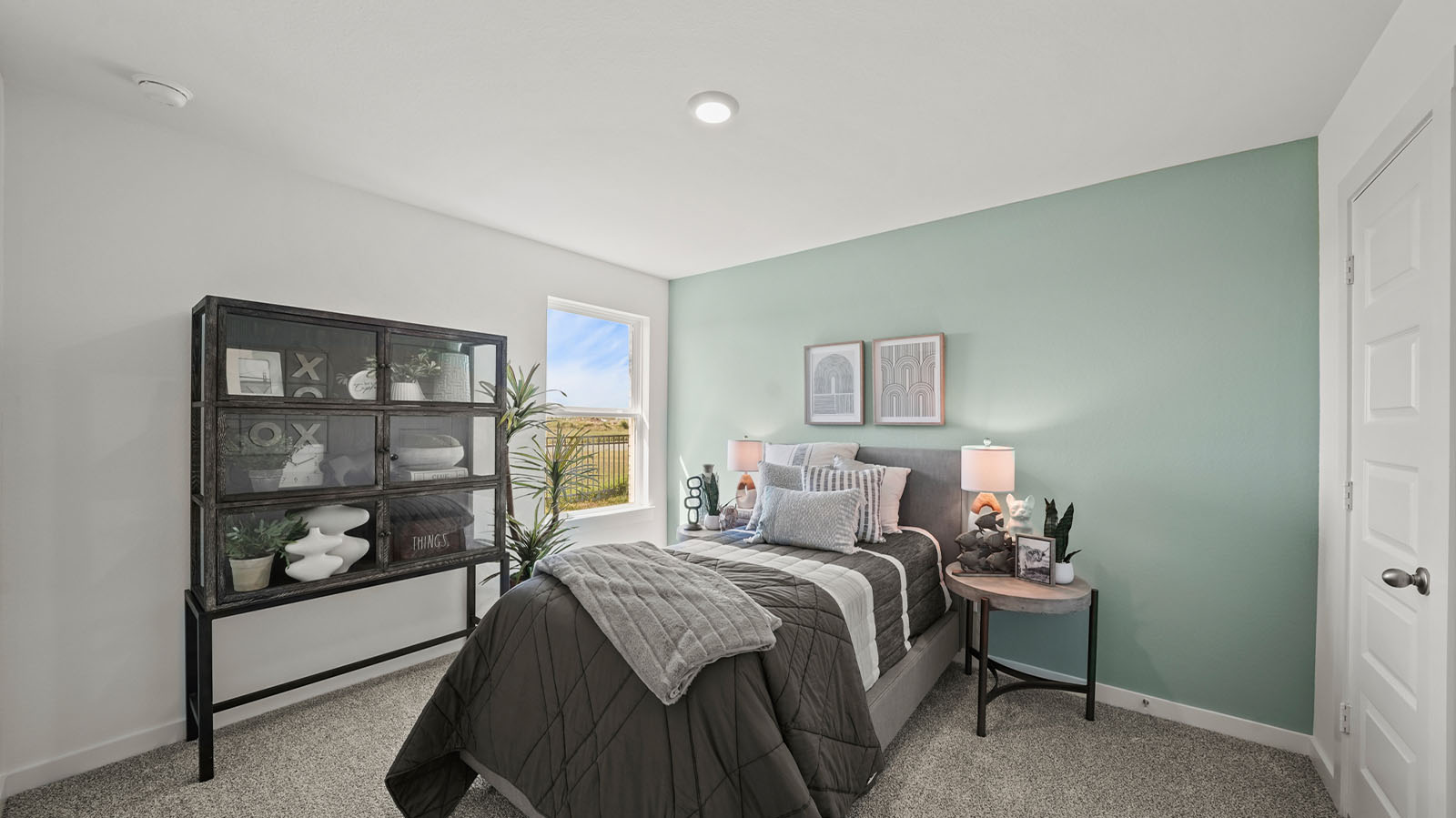 Secondary bedroom with large window
