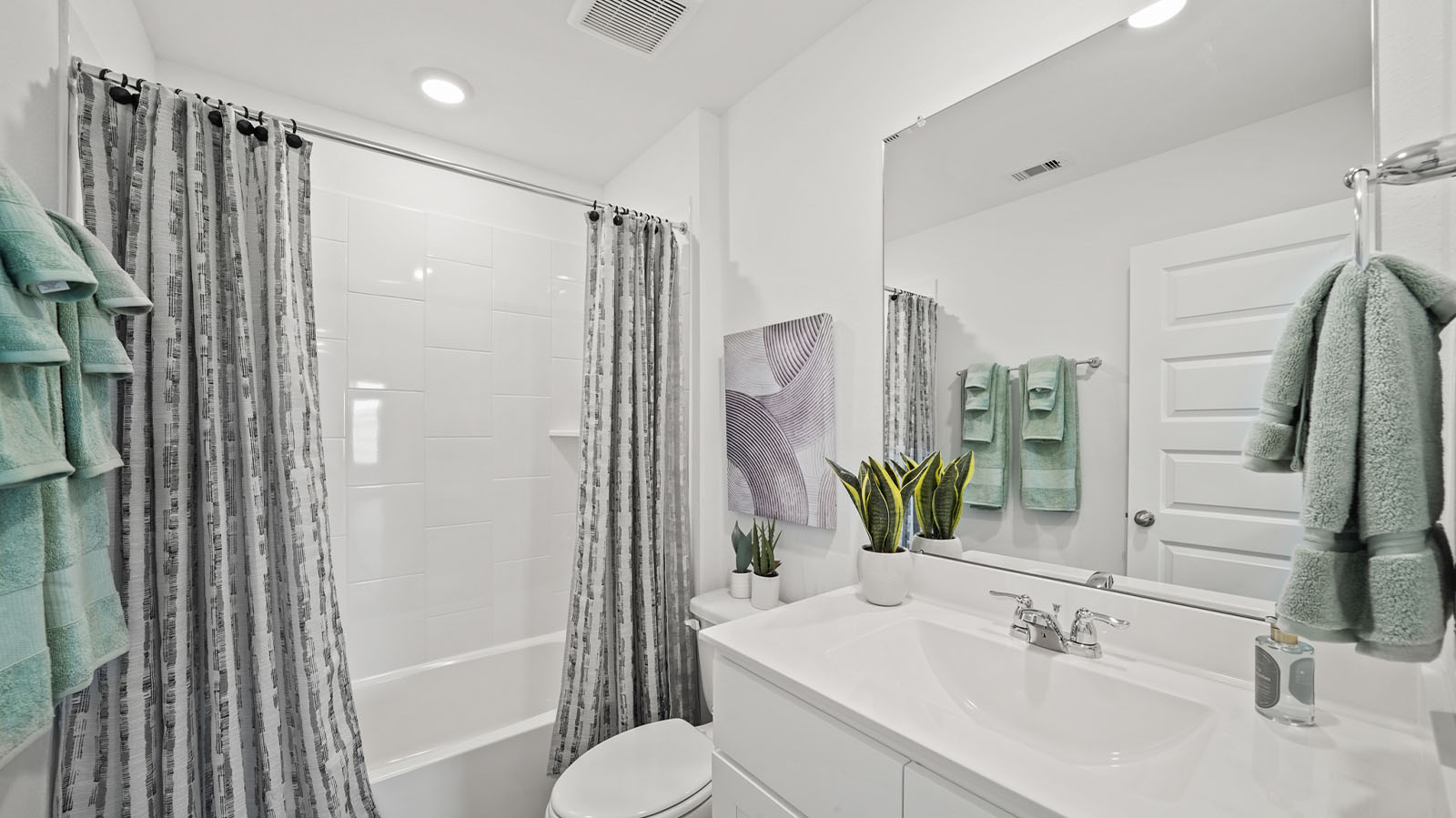 Secondary bathroom with shower and bathtub combo