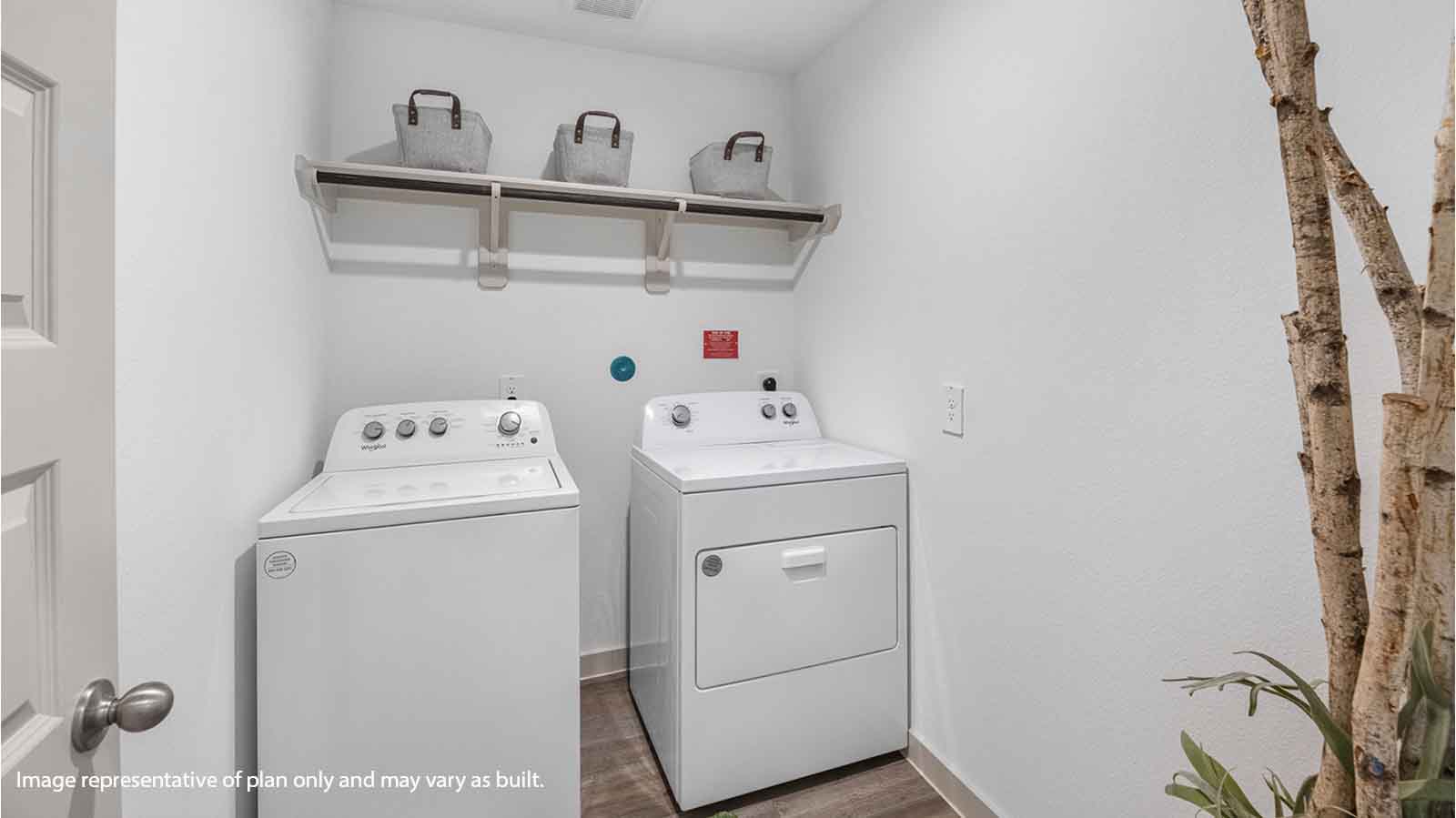 laundry room with side by side washer and dryer