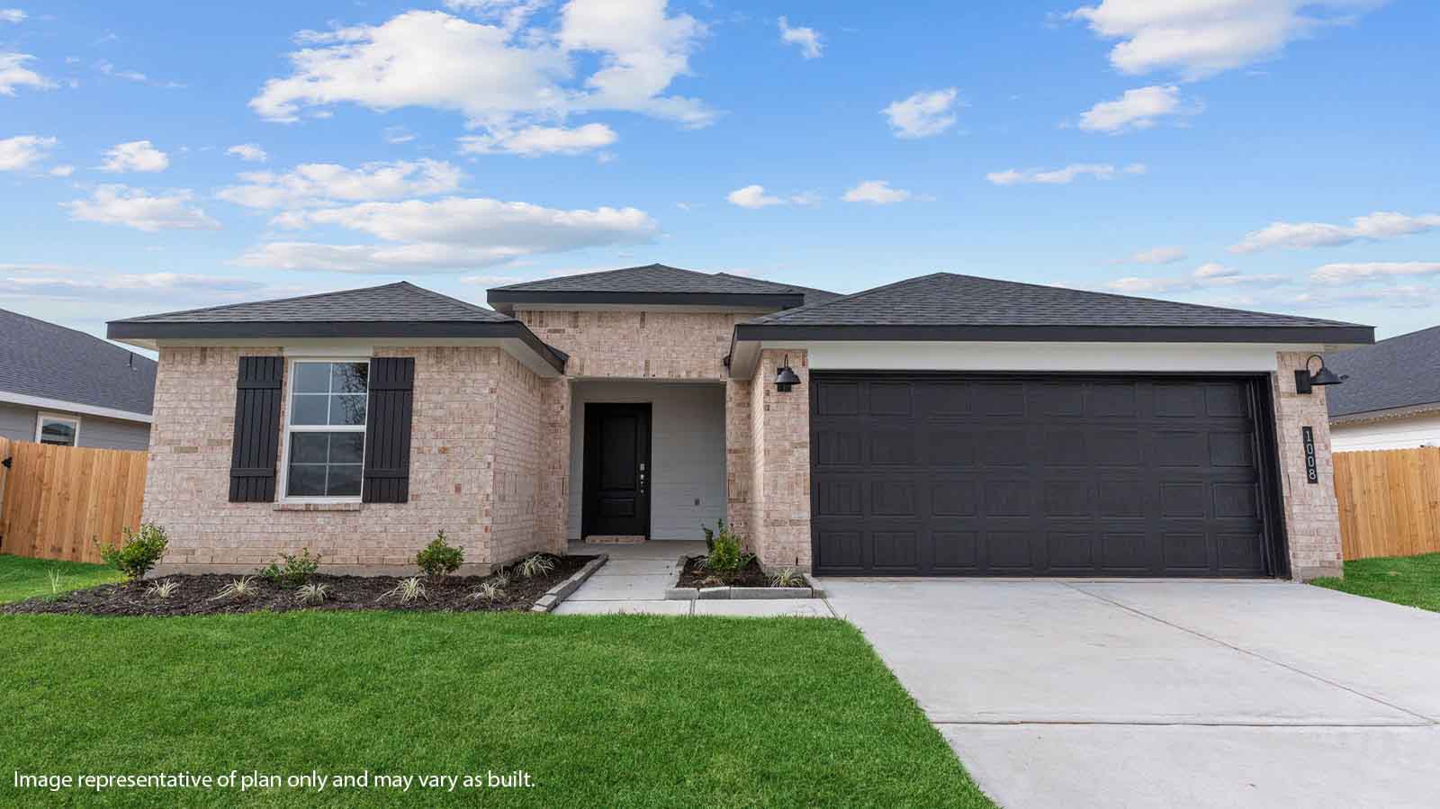 front exterior of a one story home with a two car garage