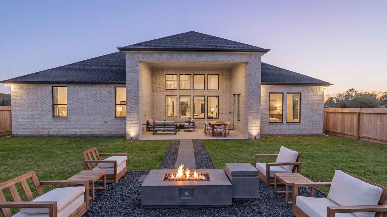 Outdoor fireplace with seating all around for those cozy winter nights