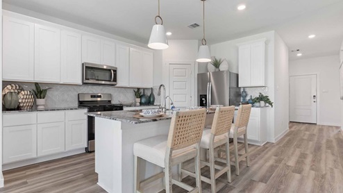 Kitchen island with amble lighting