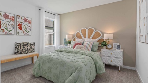 Secondary bedroom number one has one smaller window