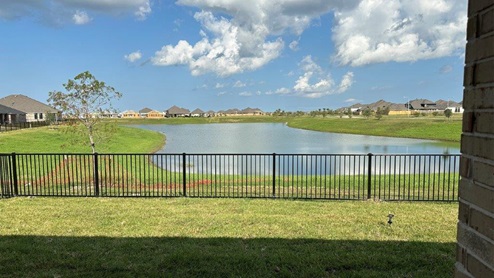 Lake View from the Backyard and iron fence