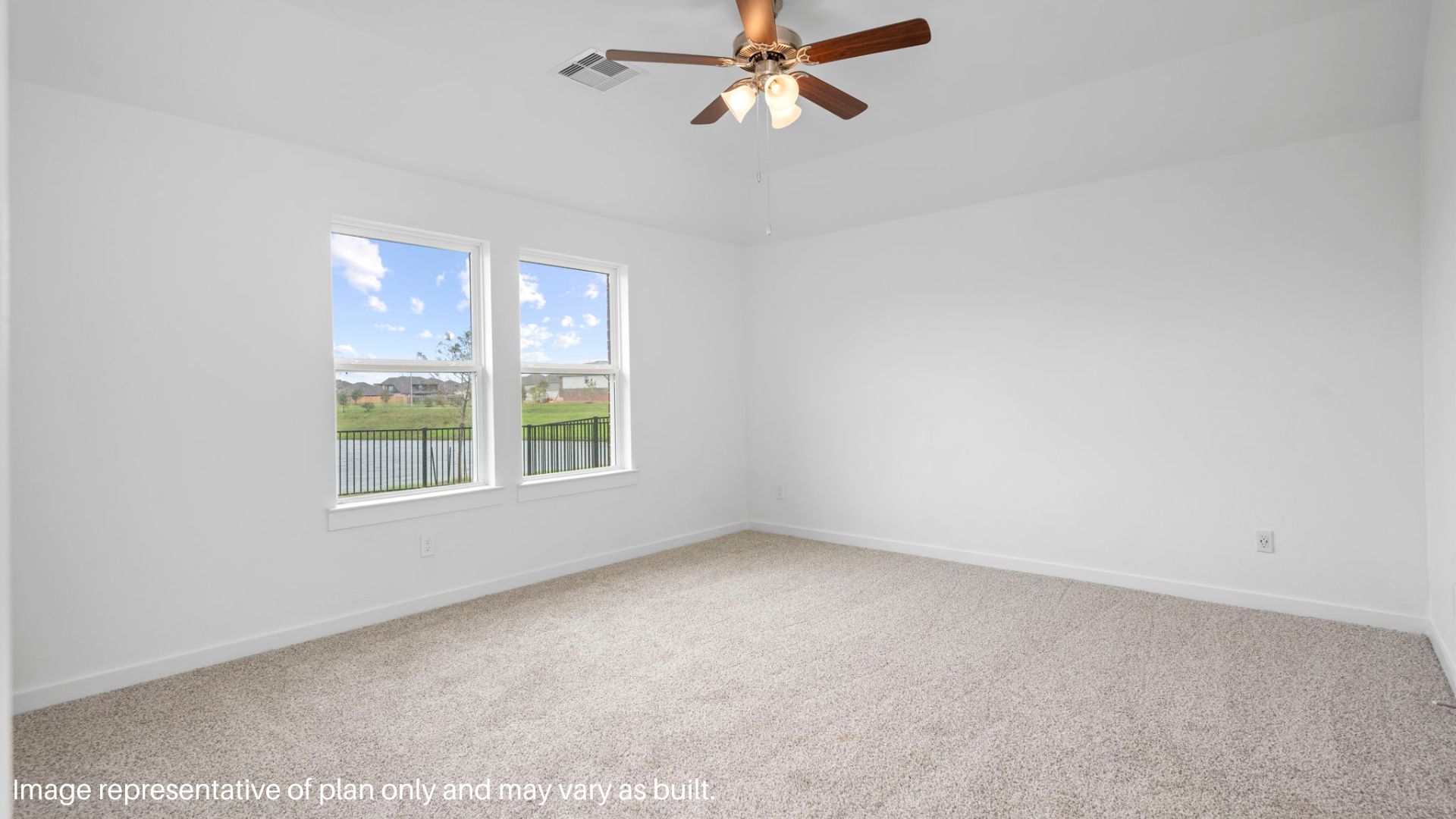 primary bedroom with two windows