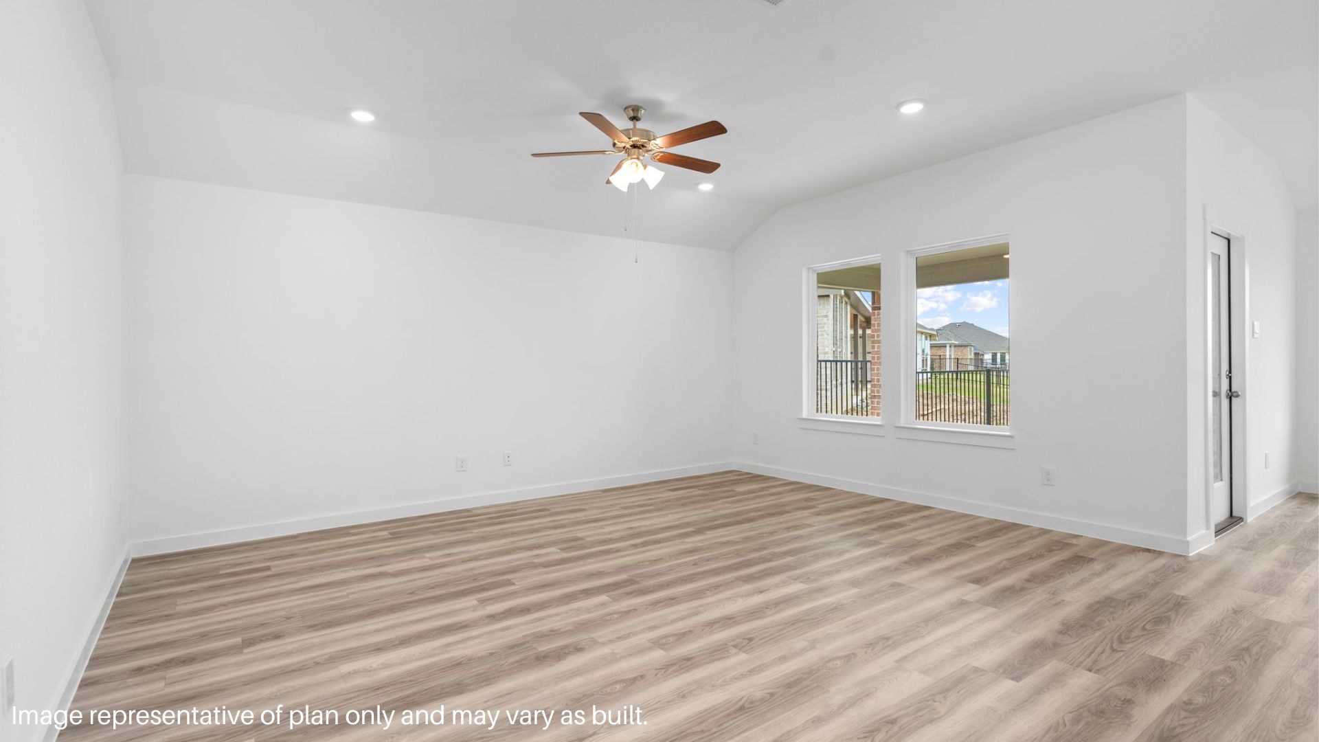 open concept living room with two windows