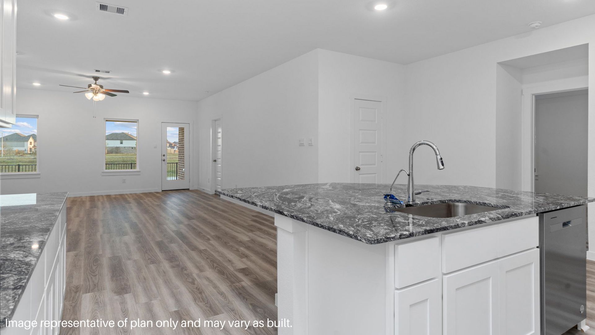 Kitchen that overlooks the beautiful dining area and Kitchen