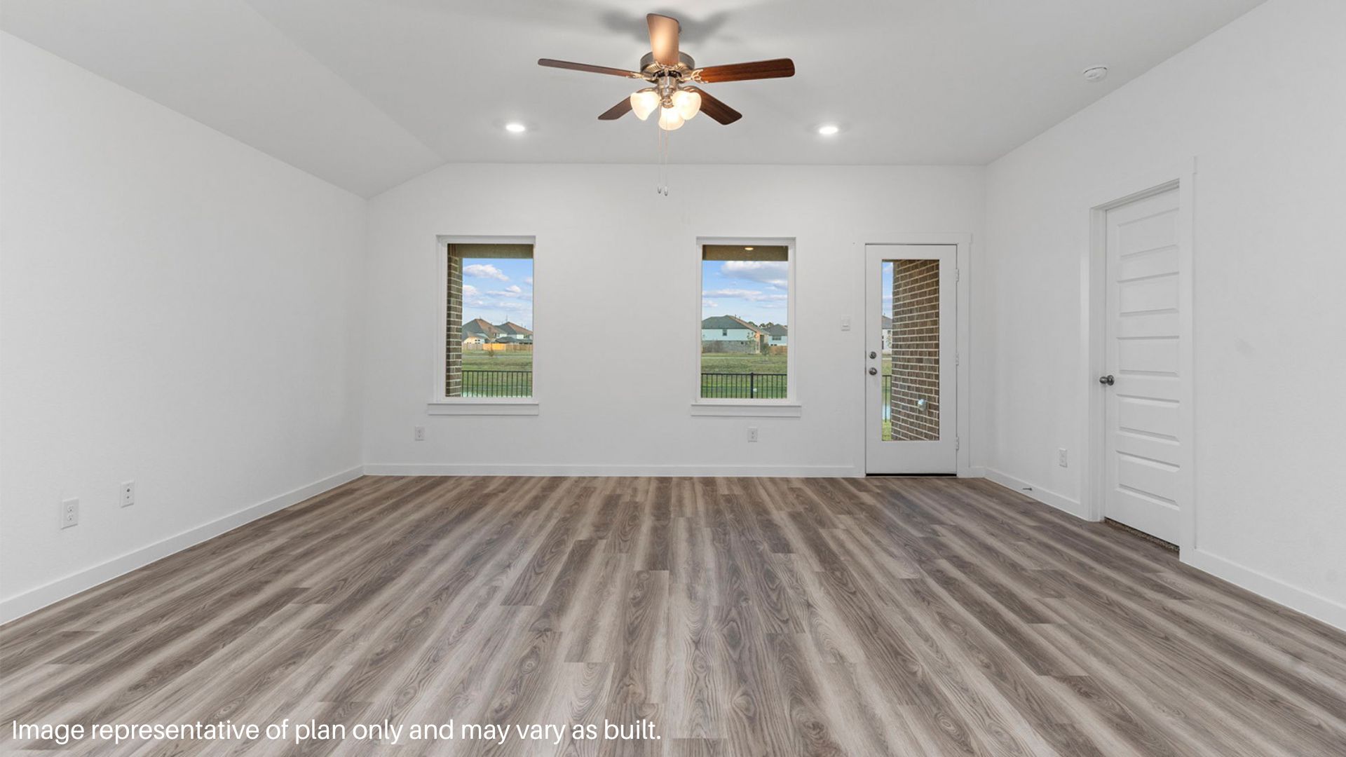 Spacious Living room with Large windows that bring in natural lighting
