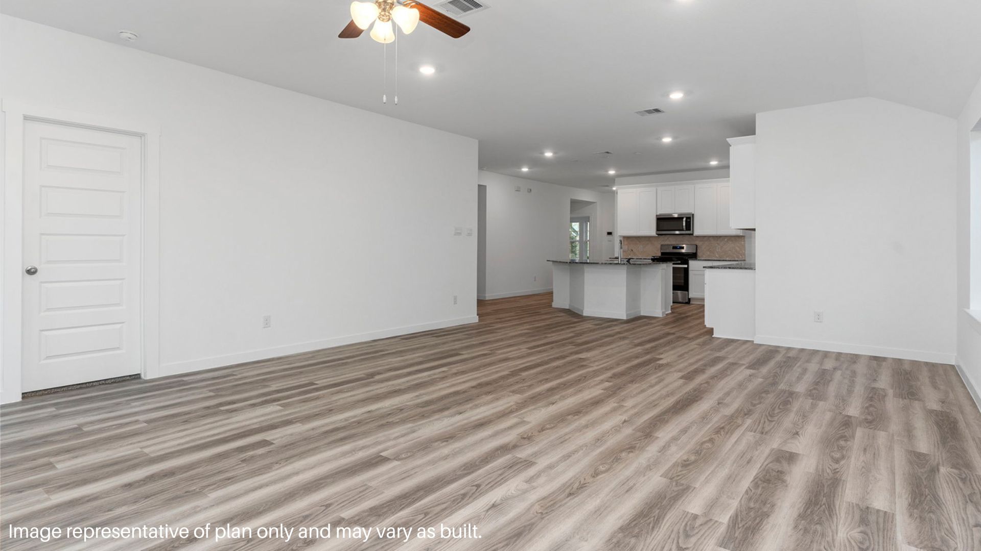 Spacious Living room with Large windows that bring in natural lighting