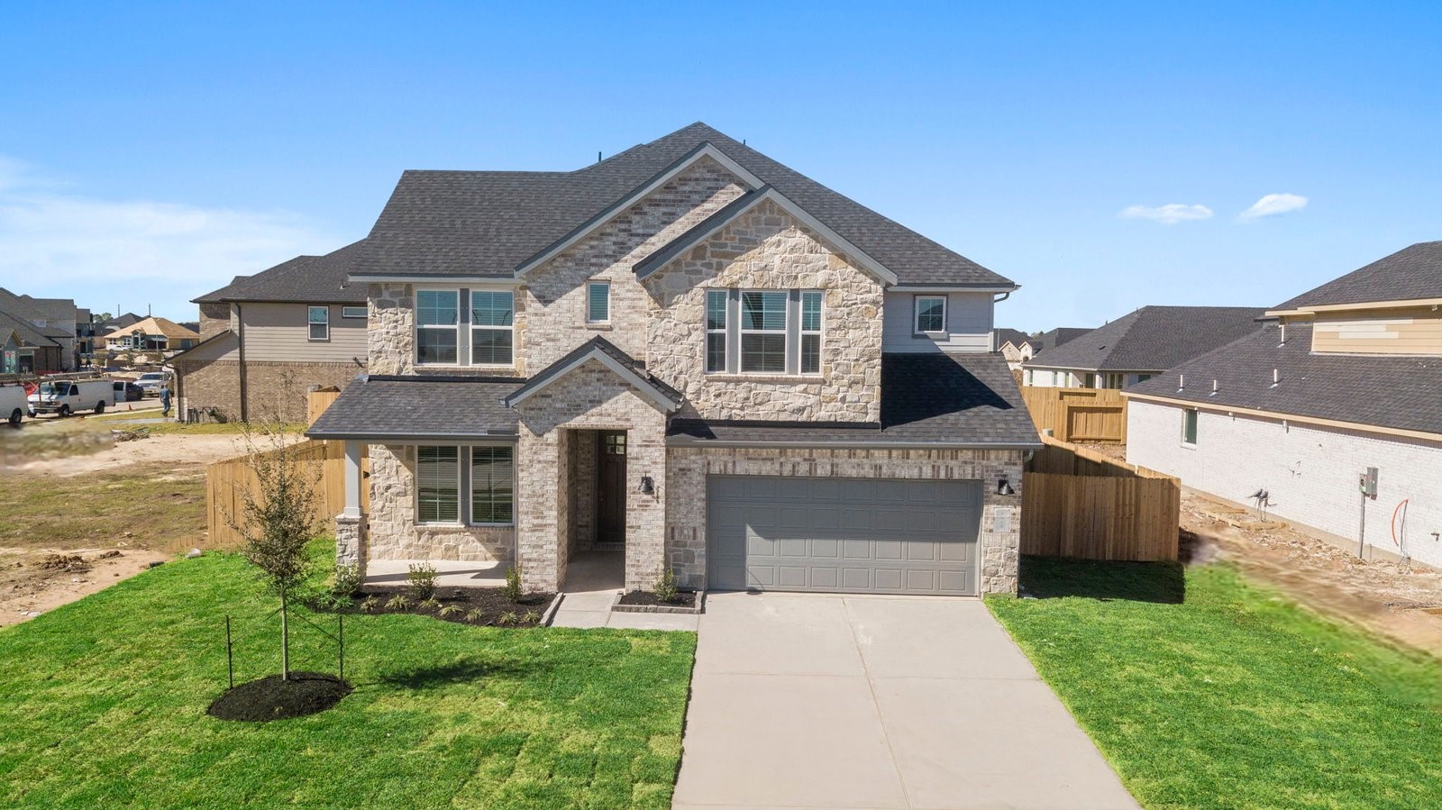 two story home with a two car garage