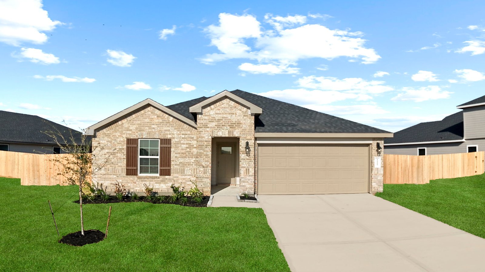 single story home with a two car garage