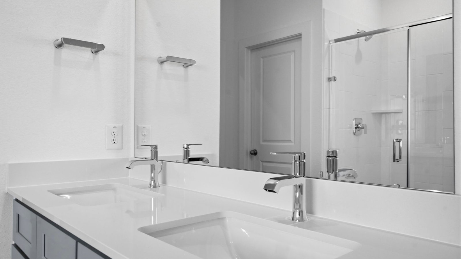 primary bathroom vanity with two sinks