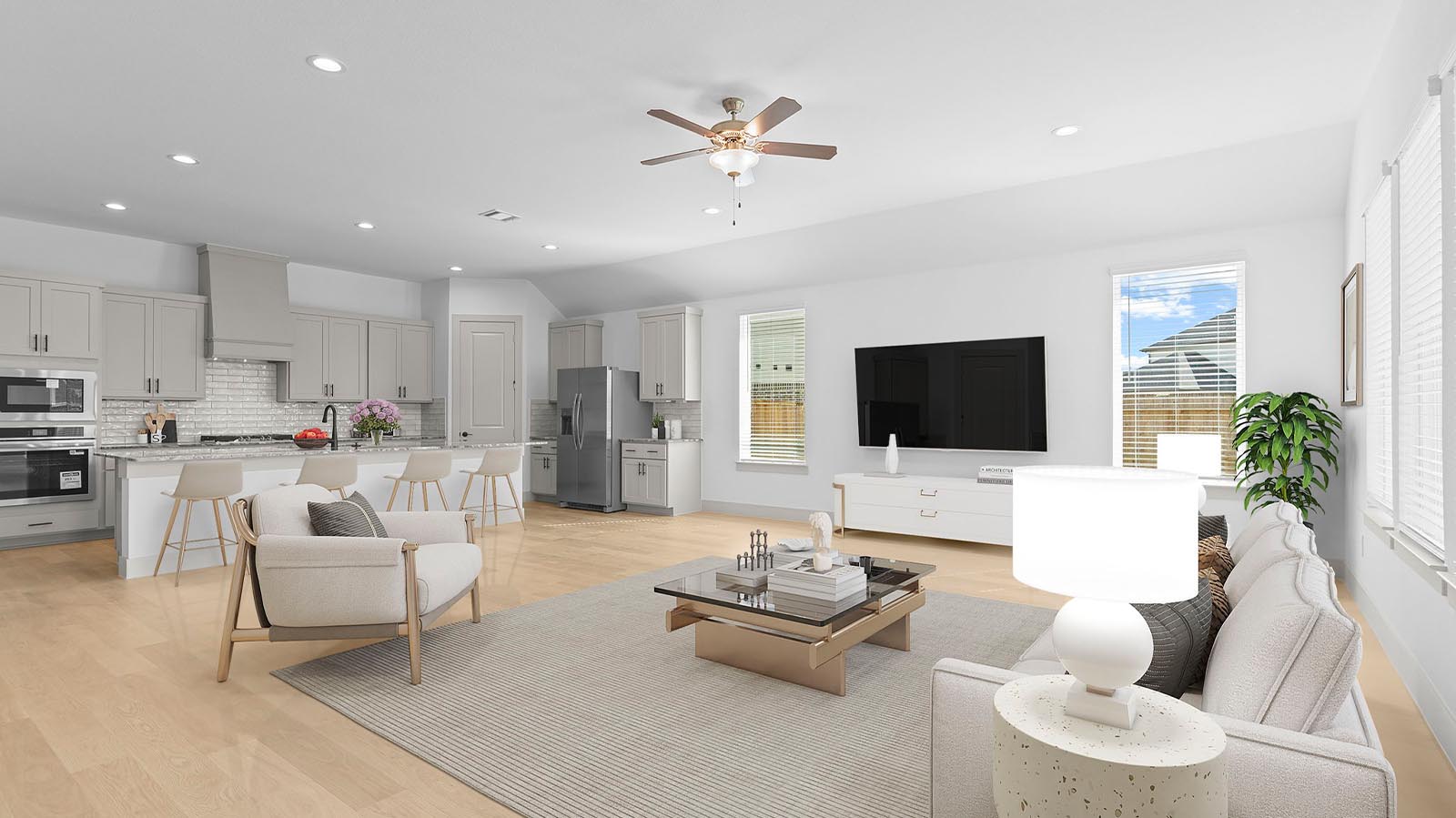 open concept living room with three windows